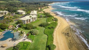 A coastal resort with a beachfront, a pool, and manicured gardens. - Oceanfront Resort, 2 QUEEN beds, water views, walk-out access to pools/ocean (Lihue)
