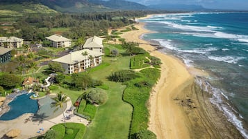 On the beach, sun loungers, beach towels