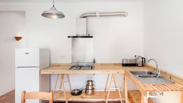 Fridge, stovetop, electric kettle, toaster
