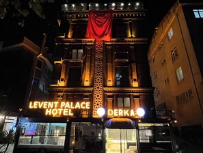 A hotel with a prominent sign reading 'Levent Palace Hotel' and 'Derka.' - Levent Palace Hotel (Istanbul)