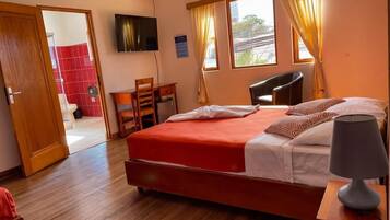 Habitación cuádruple Deluxe | Escritorio y wifi gratis