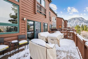 Enjoy a peaceful retreat with a spacious patio and stunning views of the surrounding landscape.
