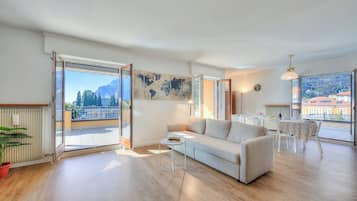 Family Apartment, 3 Bedrooms, 2 Bathrooms, Lakeside (Antares150m from the Lake) | Living area | Flat-screen TV