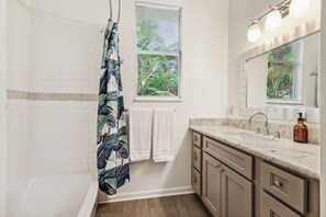 Combined shower/bathtub, hair dryer