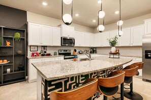 Fridge, microwave, oven, stovetop - Unforgettable Family Getaway Luxury 9BR Villa (Davenport)