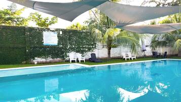 Outdoor pool, pool umbrellas, sun loungers