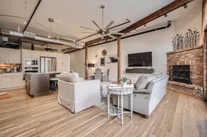 TV, fireplace, books, stereo