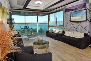 Televisión LCD de 32 pulgadas con canales por cable, una televisión