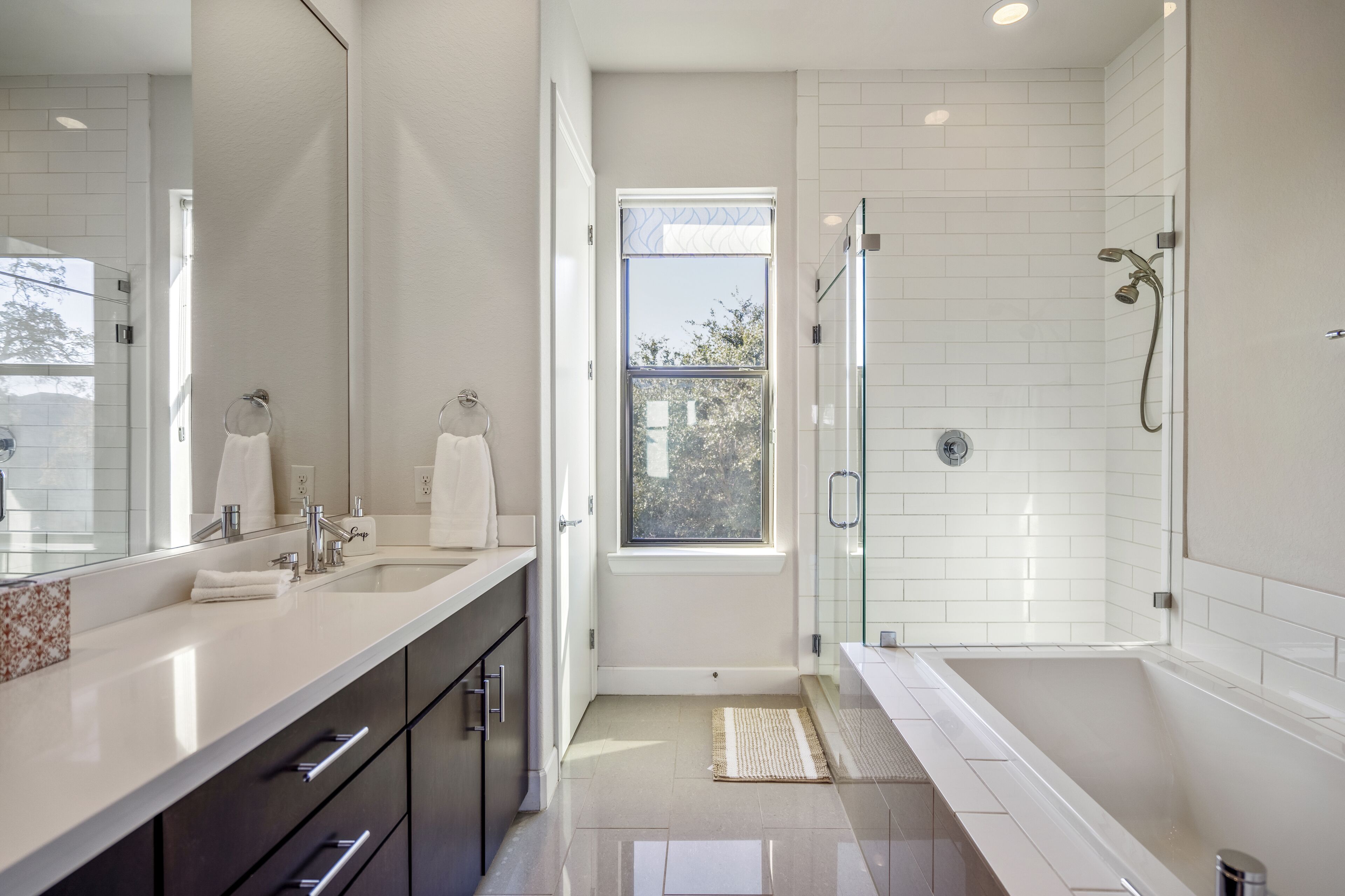 Bathtub, hair dryer, towels, soap