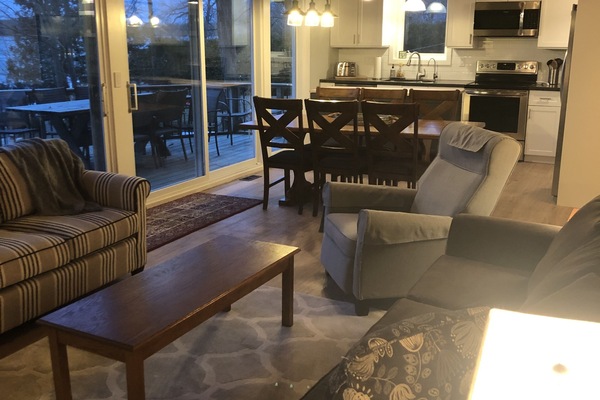 Living room, dining room that seats 8 and kitchen