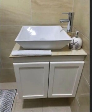 Shower, towels, soap, toilet paper