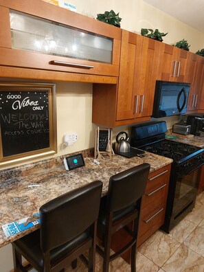 Fridge, microwave, oven, stovetop - Colorful 4-bedroom house-Vet owned-NAVAL Academy (Waukegan)