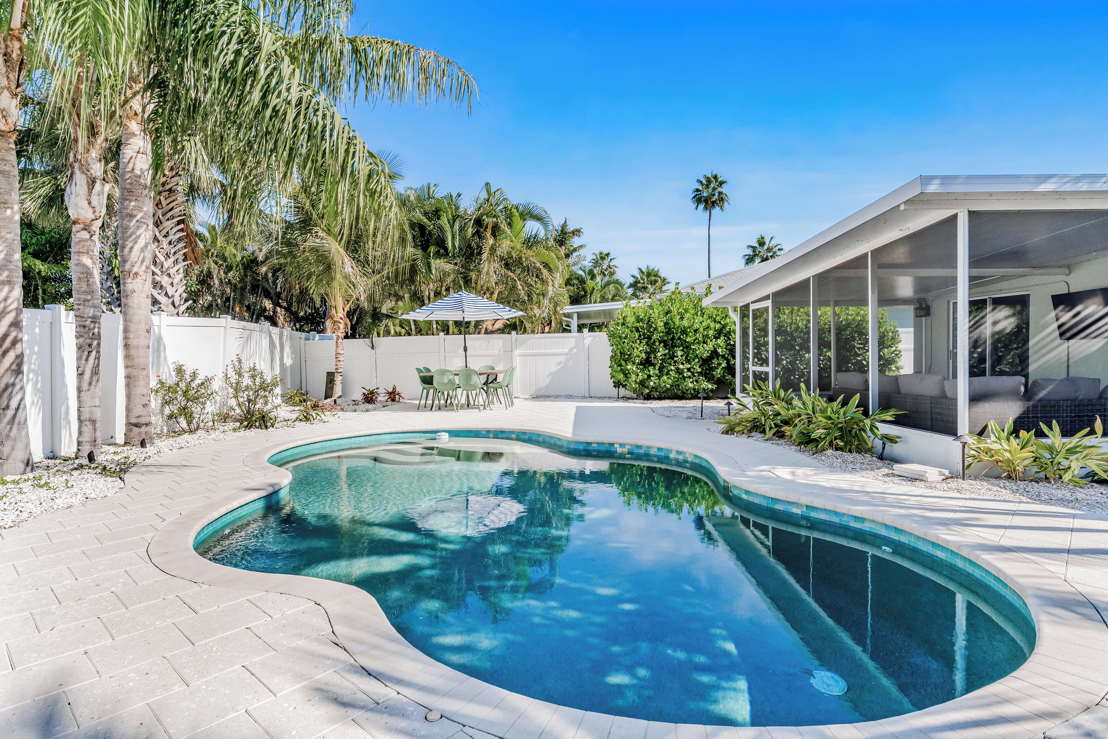 A heated pool, sun loungers