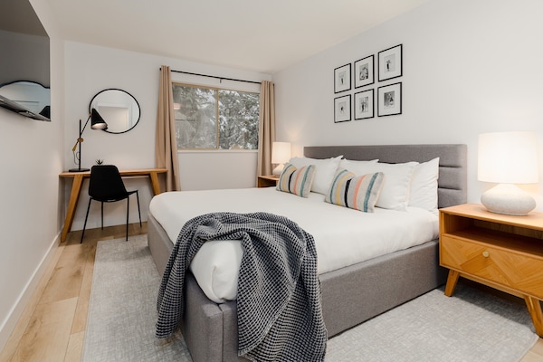 Second bedroom (upstairs) - A second retreat with a king bed, TV and desk space.
