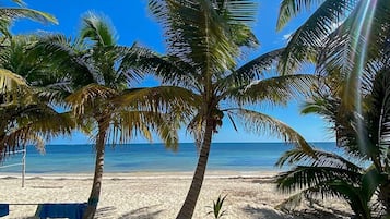 On the beach, white sand