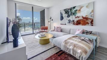 City Studio | Living area | 50-inch Smart TV with digital channels, TV, Netflix