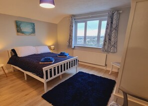 4 bedrooms, iron/ironing board, travel cot, WiFi