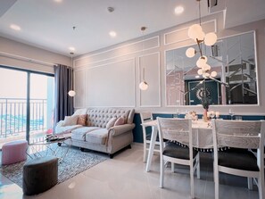 Superior Apartment | Living area | 42-inch TV with digital channels - EEM Apartments Central (Ho Chi Minh City)