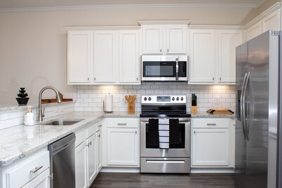 Luxury 3BD/3BA Smart Home Near ECU with Fast WiFi & FREE EV Charging!