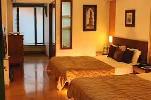 Deluxe Quadruple Room | Premium bedding, memory foam beds, minibar, laptop workspace - Outpost (Alibag)