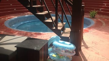 Outdoor pool, open 8:00 AM to 7:00 PM, pool umbrellas, pool loungers