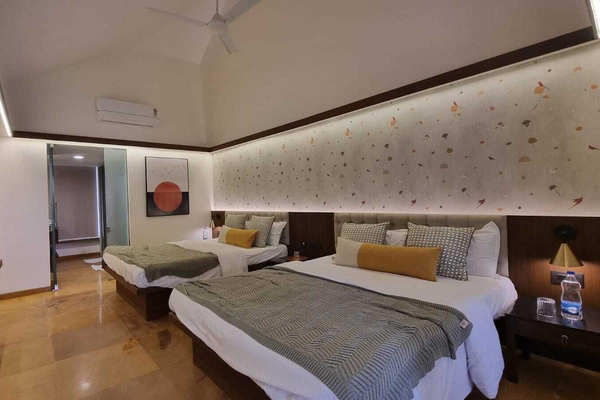 Deluxe Quadruple Room | Premium bedding, memory foam beds, minibar, laptop workspace
