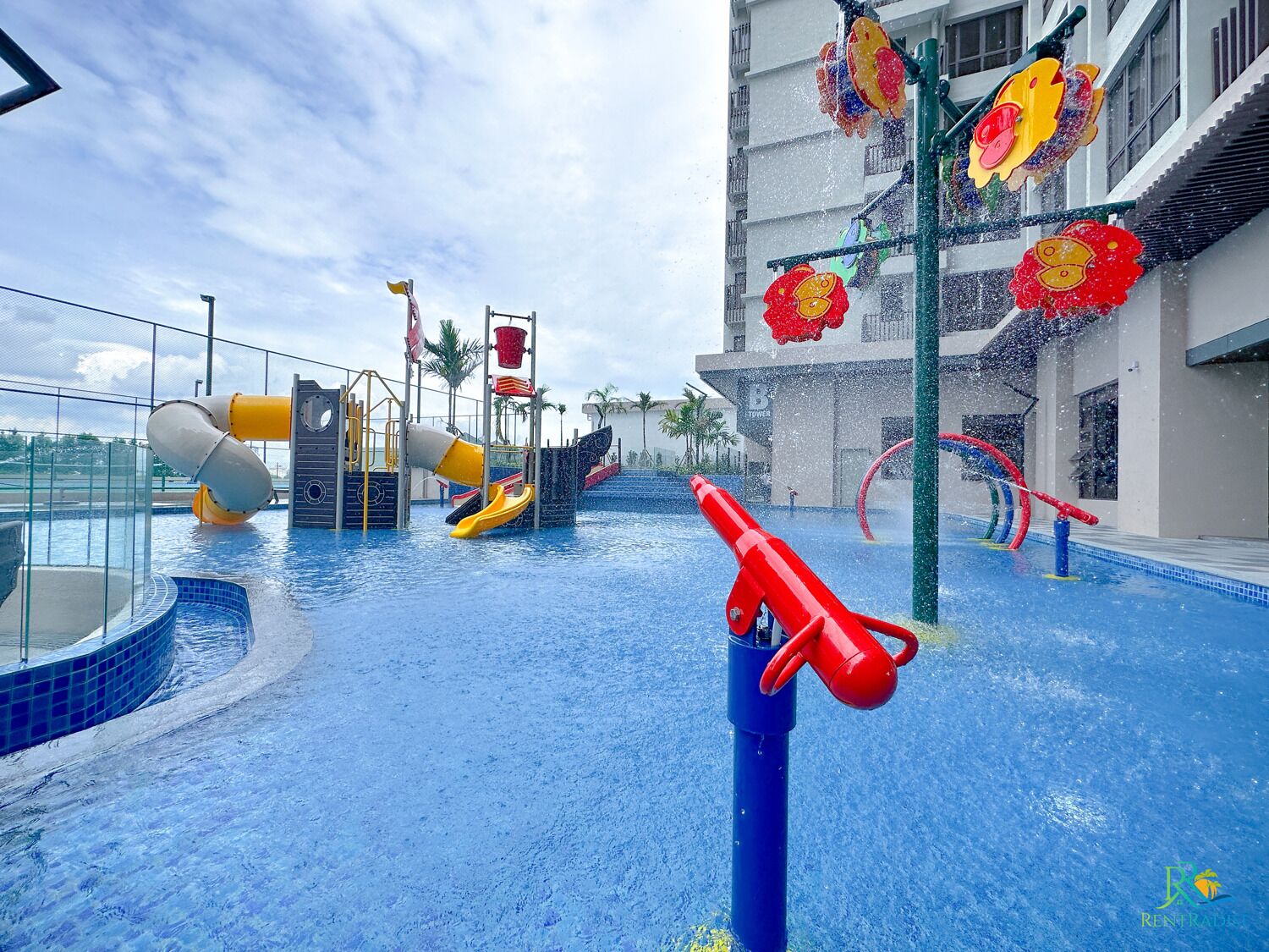 A water park area with slides and water features.
