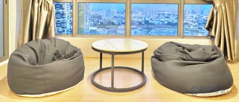 Family Apartment, 2 Bedrooms | Living area | 58-inch Smart TV with digital channels, TV, Netflix