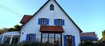 Vacation home with garden and direct access to meadows and fields