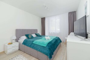 2 habitaciones, tabla de planchar con plancha, wifi y ropa de cama 