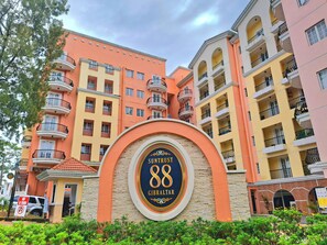 A multi-story building with balconies, a sign reading "88 Gibraltar", and a no U-turn sign. - Prestige Vacation Apartments 88 Gibratar (Baguio)