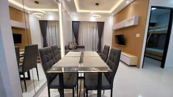 Luxury Apartment, 3 Bedrooms | Living area | 42-inch TV with cable channels
