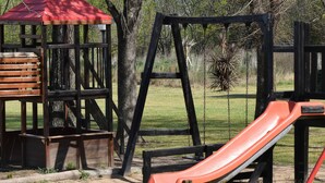 Children's play area - outdoor - Terranova Glamping (Luján)