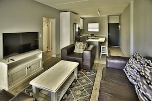 Family Apartment | Living area | 53-inch flat-screen TV with cable channels - Nivica Lifestyle Living 19, Langebaan 4-Sleeper (Langebaan)