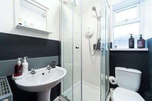 Shower, hair dryer, towels, soap