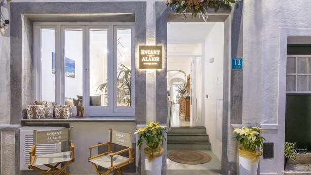 A boutique hotel entrance with a sign reading "ENCANT DE ALAIOR BOUTIQUE HOTEL". - Encant de Alaior Boutique Hotel  (Alayor)