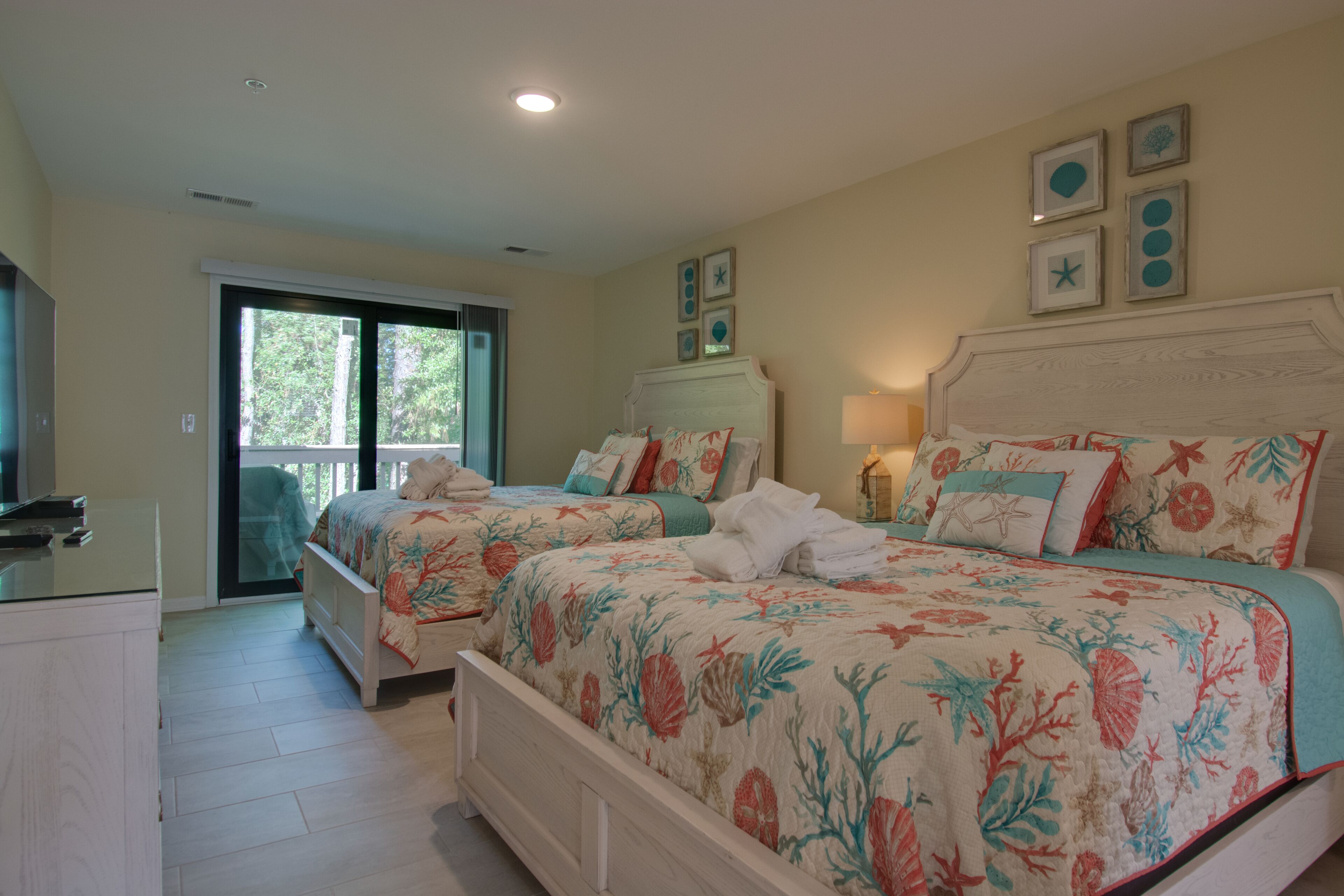 Signature Condo, 2 Bedrooms, Balcony, Lagoon View | Living area | 65-inch Smart TV with cable channels, TV, Netflix