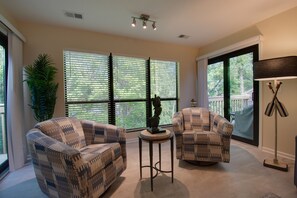 Signature Condo, 2 Bedrooms, Balcony, Lagoon View | Living room | 65-inch Smart TV with cable channels, TV, Netflix - Spacious Condo in the Heart of Hilton Head (Hilton Head Island)