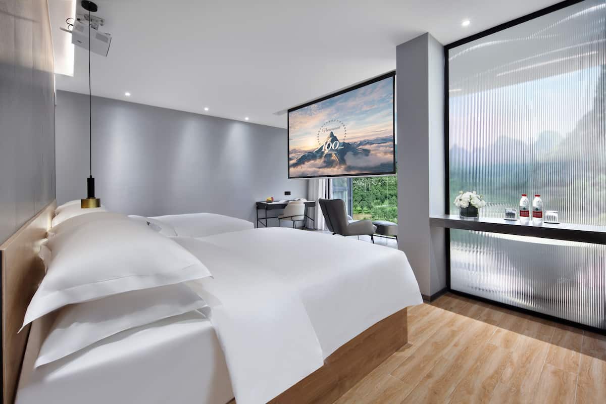 Premium bedding, down duvets, pillow-top beds, individually decorated