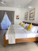 スタンダード トリプルルーム | 高級寝具、羽毛の掛け布団、ピロートップベッド、ミニバーのアイテム (無料)