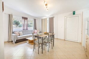 Villa Iris with Private pool, Panoramic Mountain Views | Living area | 42-inch LCD TV with satellite channels, TV