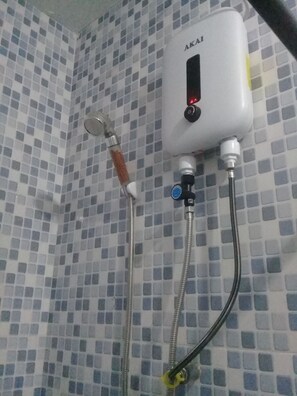 Shower, towels, soap, toilet paper