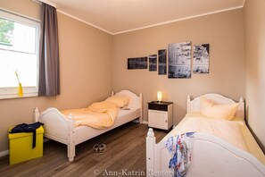 2 quartos, berço de viagem, Wi-Fi de cortesia, roupa de cama
