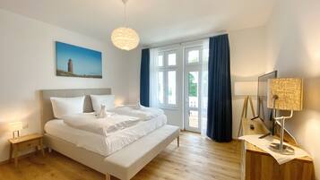 1 slaapkamer, een strijkplank/strijkijzer, reisbedje, gratis wifi