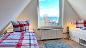 2 habitaciones, cuna de viaje, wifi gratis y ropa de cama