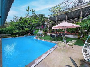 Outdoor pool, open 6:00 AM to 10:00 PM, pool umbrellas, sun loungers - CALI HILL RESORT & SPA (Phu Quoc)