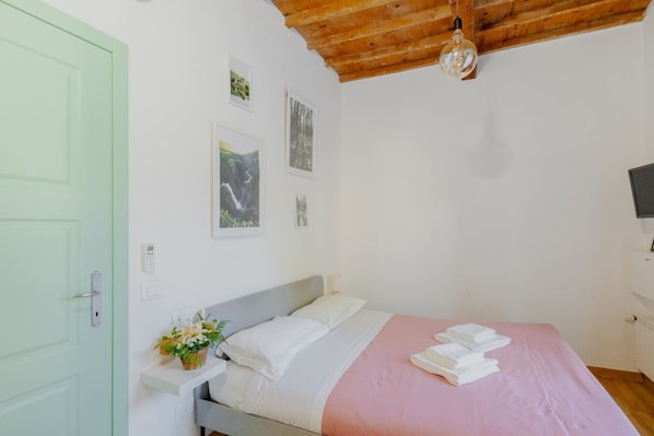1 bedroom, desk, iron/ironing board, travel cot