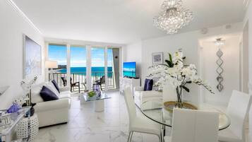 Condo, 1 King Bed with Sofa bed (Modern beachfront condo with pool, gy) | Living area