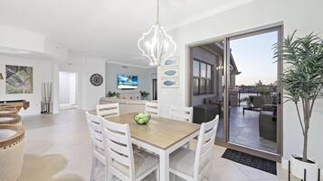 Condo, Multiple Beds (Exquisite condo with unique balcony a) | Dining