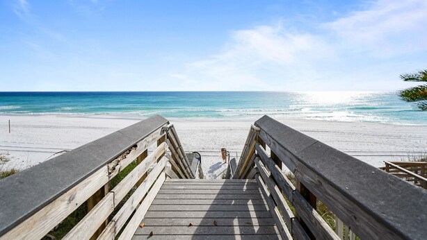 A wooden boardwalk leading to a beach with a clear view of the ocean. - Fantastic 2-Bed Miramar Condo! Pool & Private Media Room | Fall Specials! (Miramar Beach)